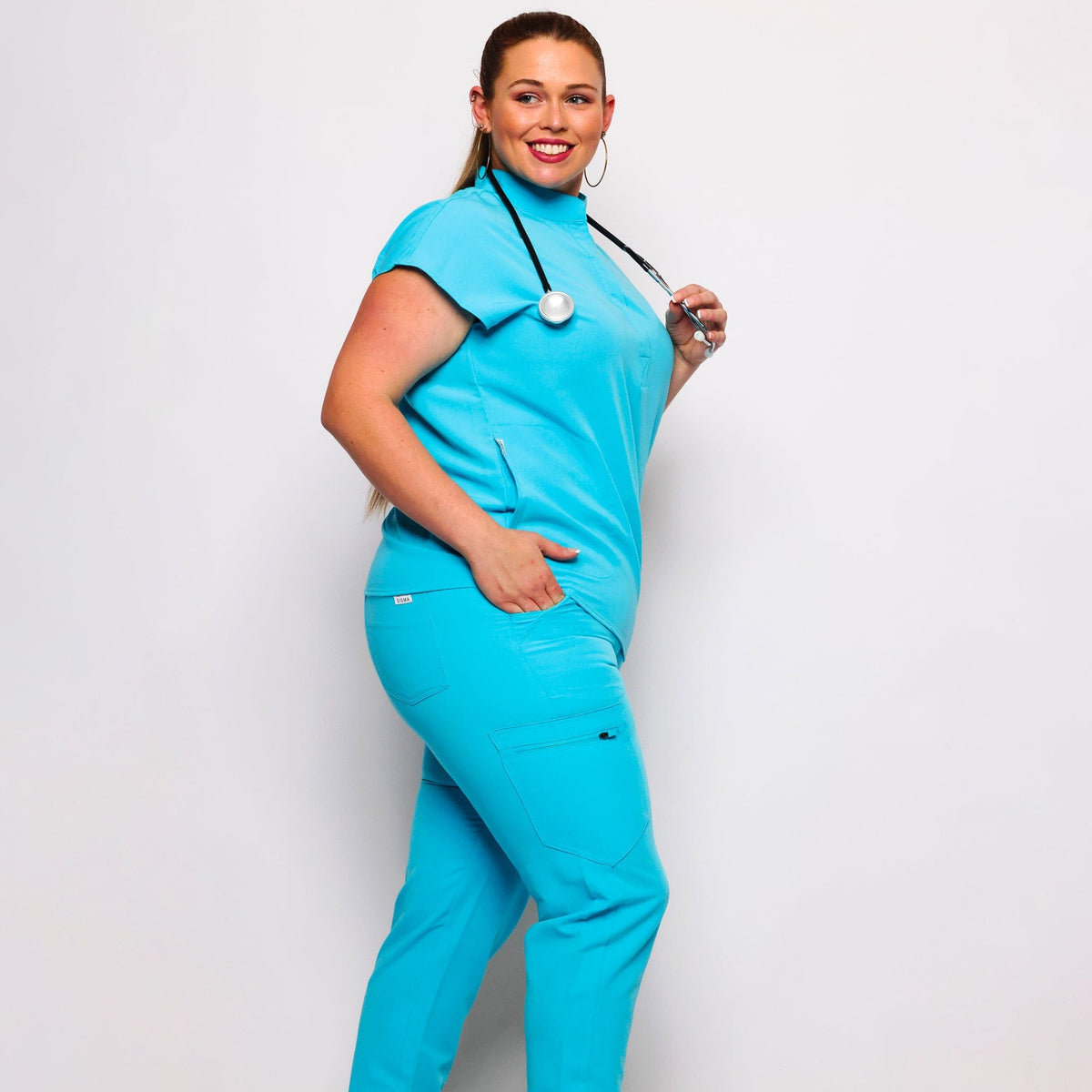 Colossal Scrub Top Turquoise | sigmascrubs.com